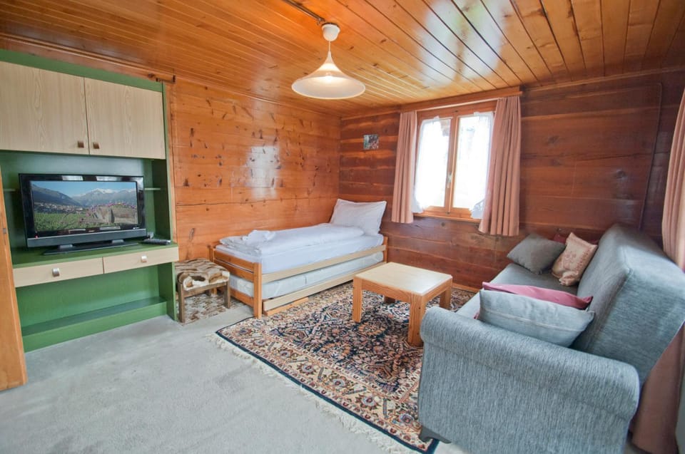 Bed, Living room, Seating area
