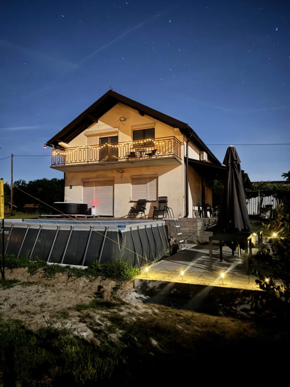 Property building, Night, Pool view, Swimming pool