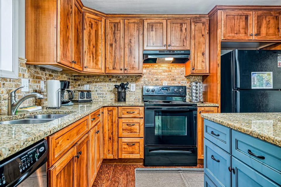 Kitchen or kitchenette, oven, stove, toaster