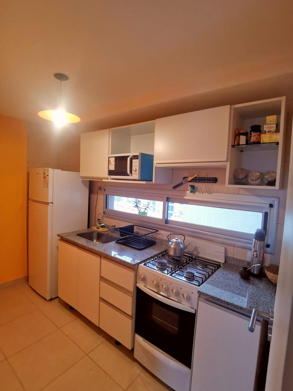 Kitchen or kitchenette, oven, stove