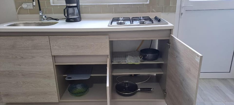 Kitchen or kitchenette, stove