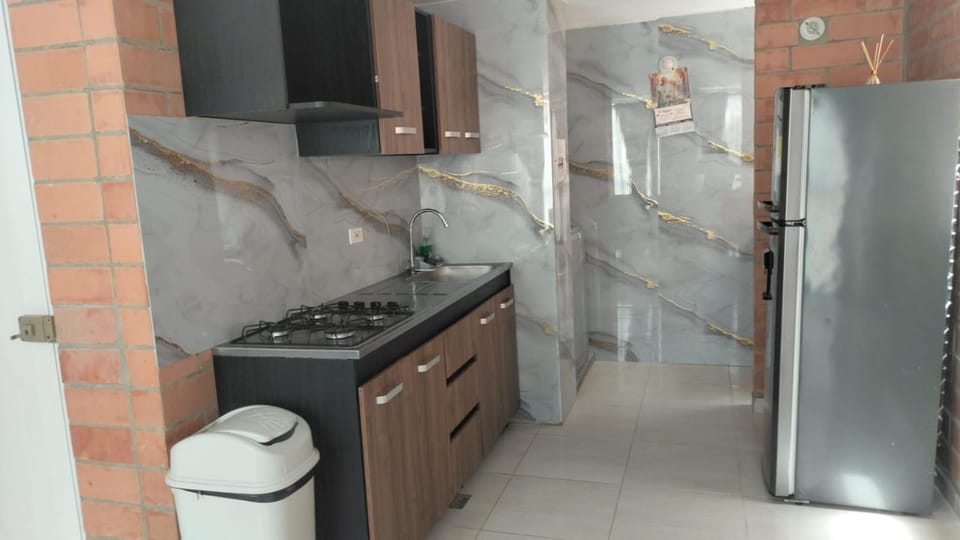 Kitchen or kitchenette, dishwasher, stove