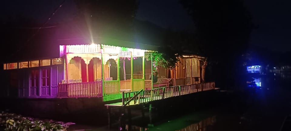 Veena Palace Group Of Houseboats Docked boat in India