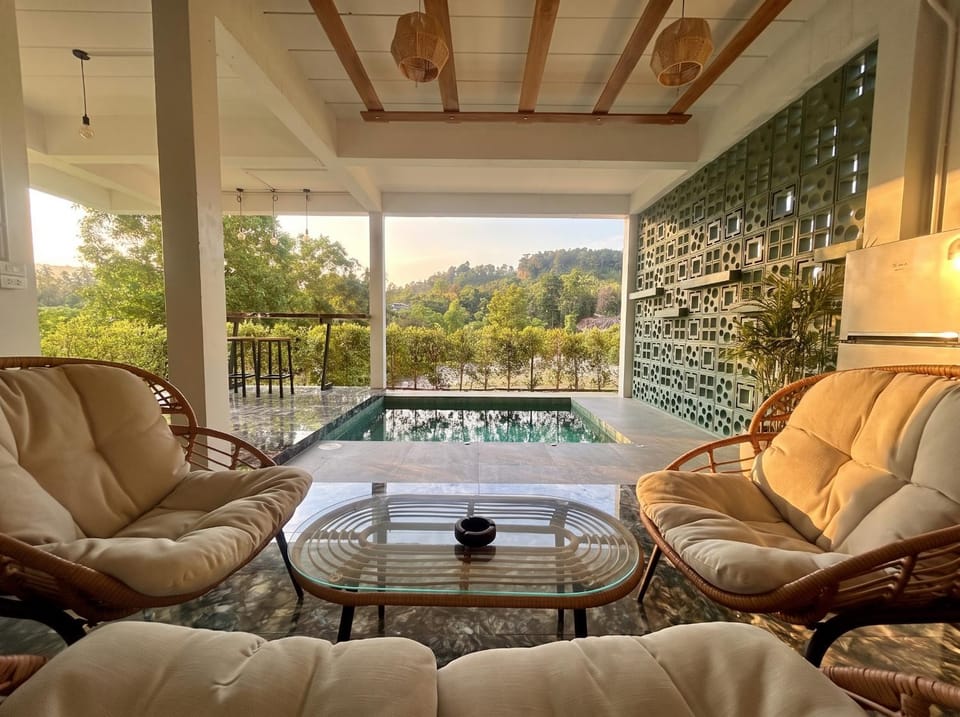 Day, Natural landscape, Balcony/Terrace, Living room, Seating area, Mountain view, Swimming pool, Sunrise