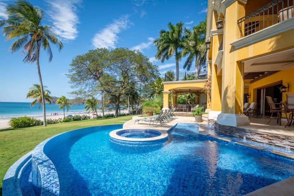 Elegant Mediterranean-Style Mansion with Beachfront Views and Private Infinity Pool House in Playa Flamingo