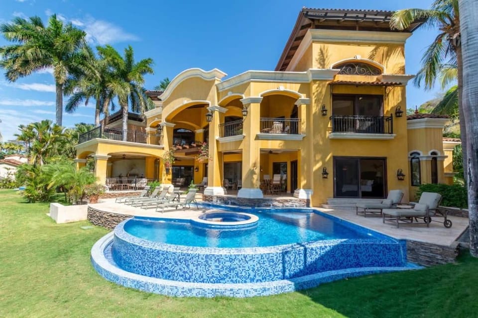 Elegant Mediterranean-Style Mansion with Beachfront Views and Private Infinity Pool House in Playa Flamingo