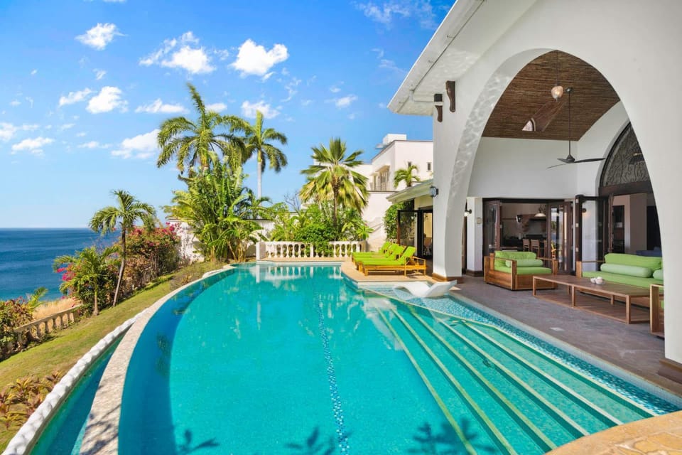 Dreamy Spanish-Style Villa with Sweeping Ocean Views, Elegant Nautical Design & Giant Infinity Pool House in Playa Flamingo