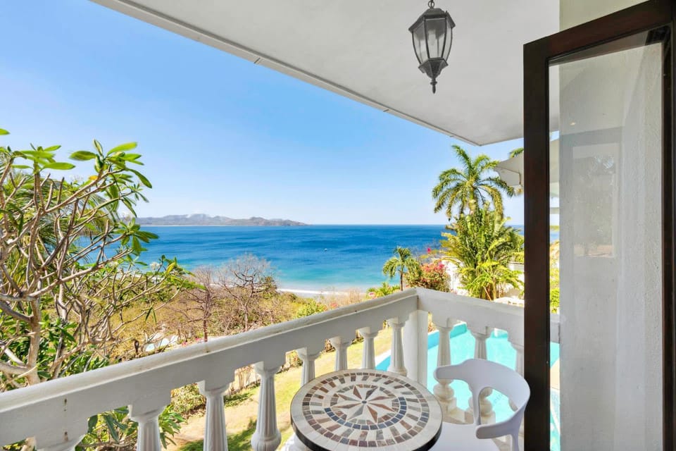 Dreamy Spanish-Style Villa with Sweeping Ocean Views, Elegant Nautical Design & Giant Infinity Pool House in Playa Flamingo