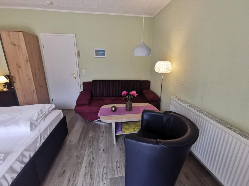 Bed, Living room, Seating area