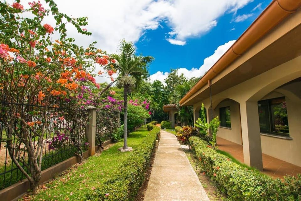 Cozy Garden Condo with Vibrant Tropical Decor, Swimming Pool and Rancho House in Guanacaste Province