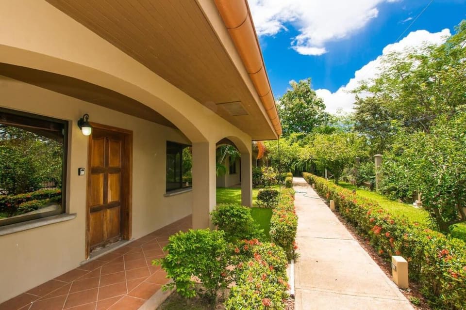 Cozy Garden Condo with Vibrant Tropical Decor, Swimming Pool and Rancho House in Guanacaste Province