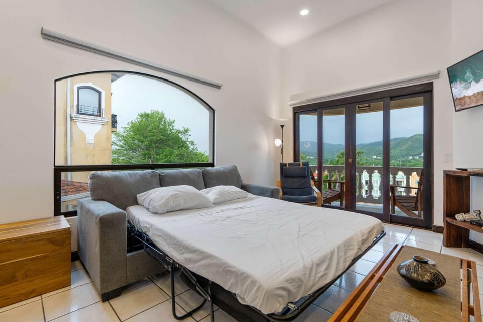 Top-Floor Condo with Sweeping Ocean, Mountain & Marina Views House in Playa Flamingo