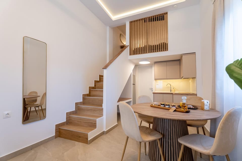 Kitchen or kitchenette, Living room, Seating area, Dining area
