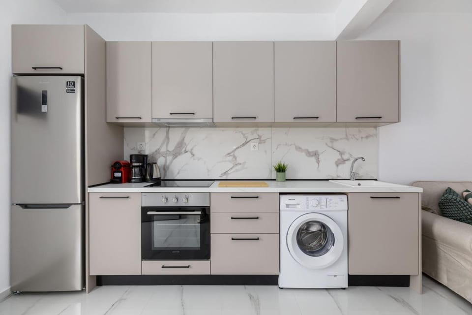 Kitchen or kitchenette, oven, stove, washing machine