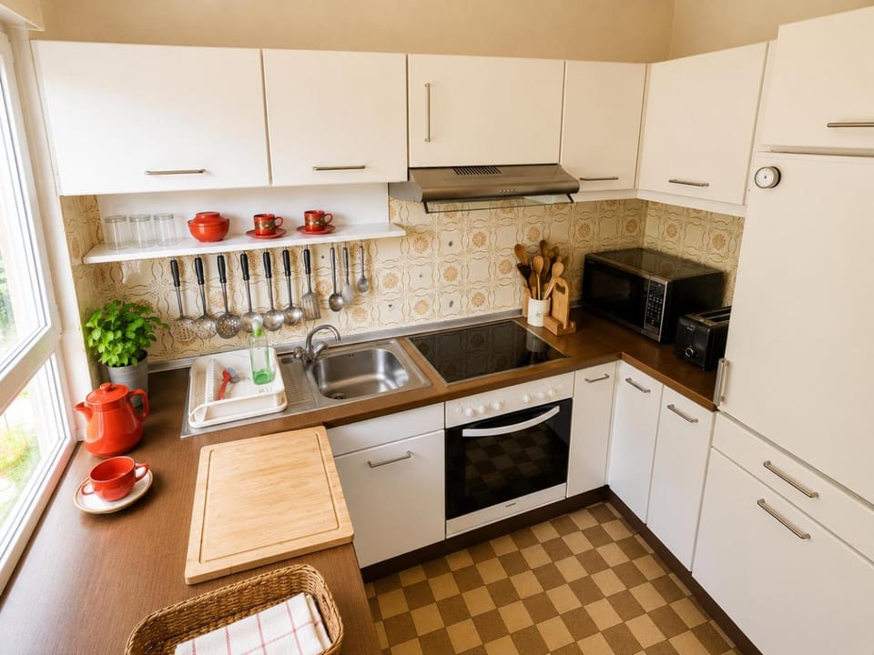 Kitchen or kitchenette, oven, stove