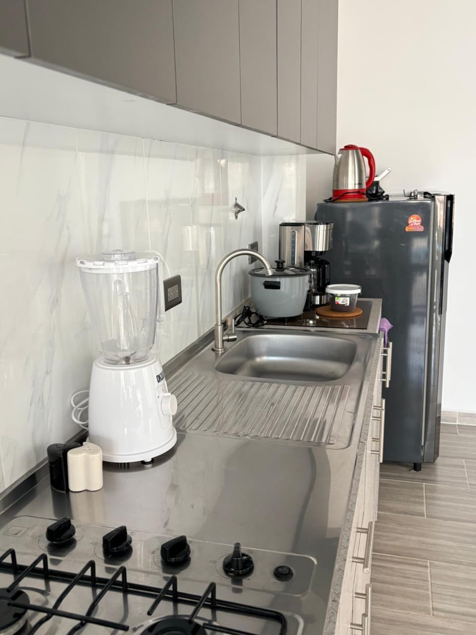 Kitchen or kitchenette, stove, toaster