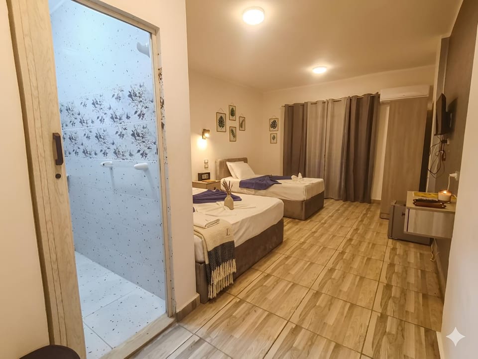 Bed, Bathroom, Quiet street view, towels