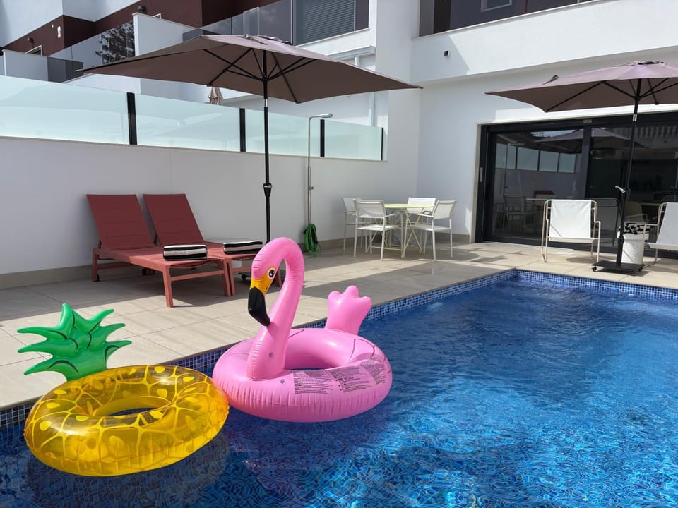 Patio, Day, Pool view, Swimming pool, sunbed