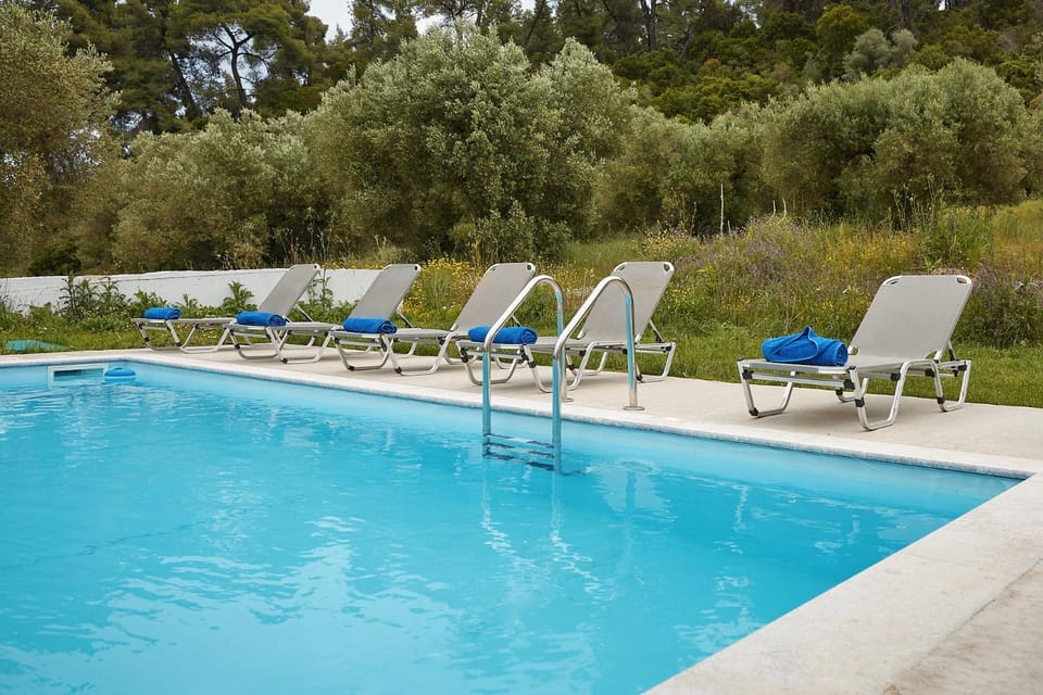 View (from property/room), Garden view, Mountain view, Pool view, Swimming pool, sunbed, towels