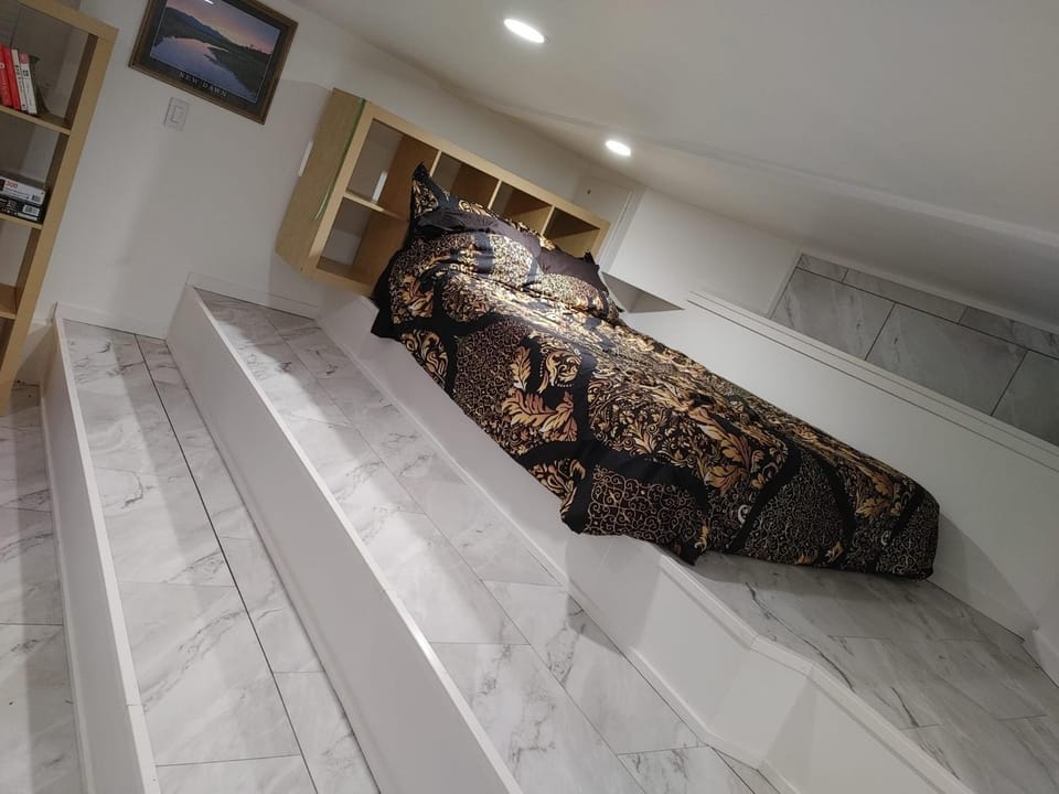 Bed, Living room, Seating area, Bedroom