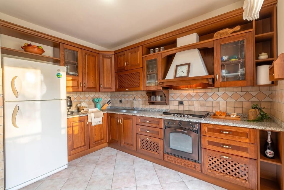Kitchen or kitchenette, oven, stove