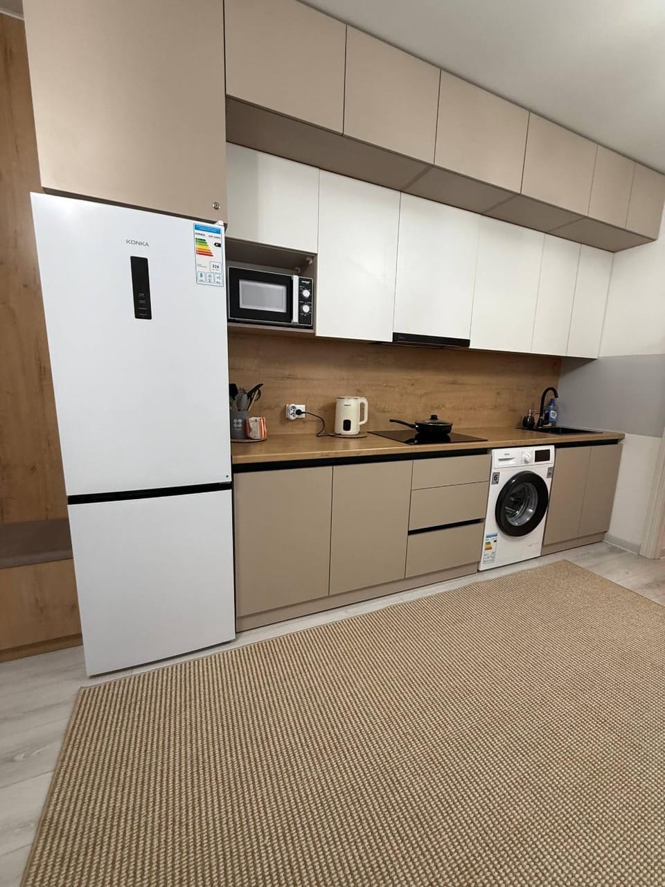 Kitchen or kitchenette, stove, washing machine