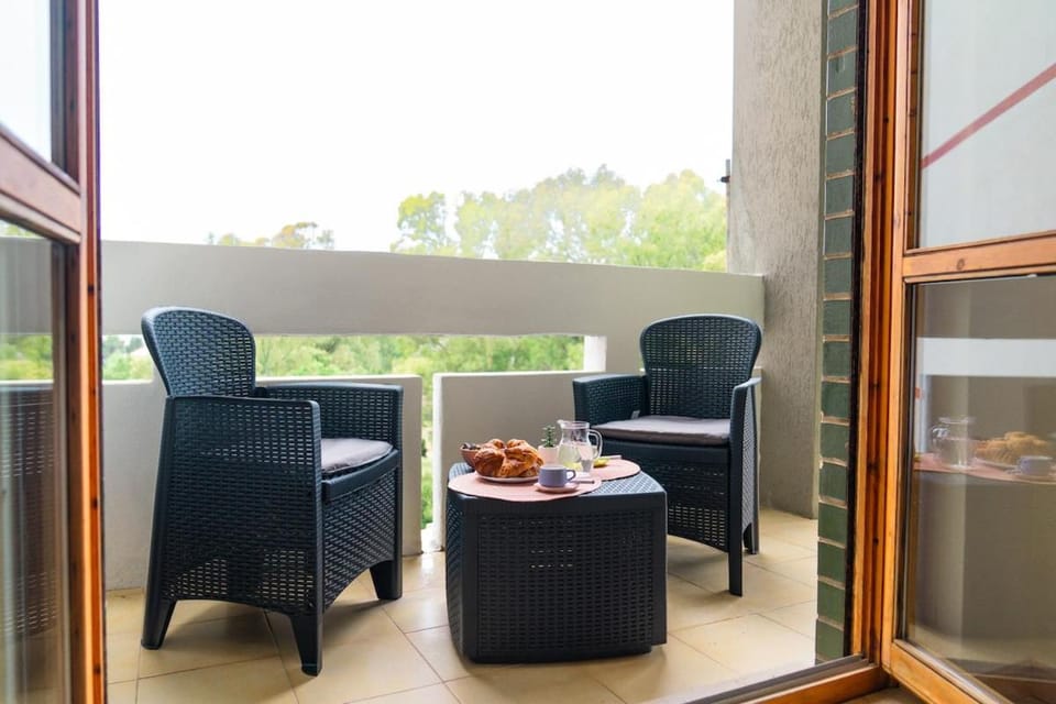 Casa Mara - Central Carbonia, AC, private balcony & full kitchen Apartment in Carbonia