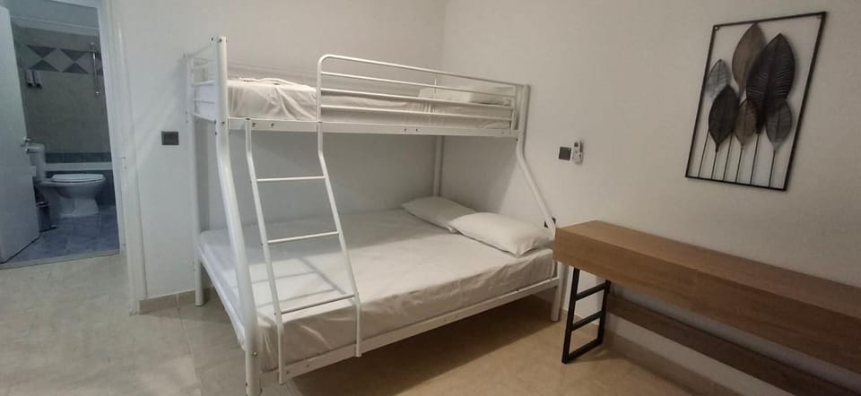bunk bed, flat iron, safe, wardrobe, air conditioner