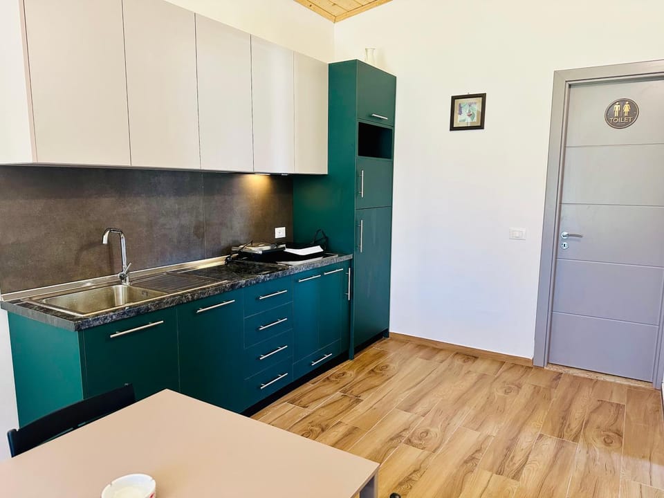 Kitchen or kitchenette, stove