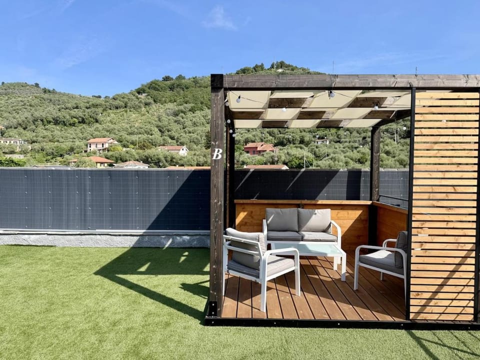 HOST4U - Dimora degli Ulivi, New Apartment with Two Bedrooms, Terrace and Parking, 10 minutes from the beach Apartment in Imperia