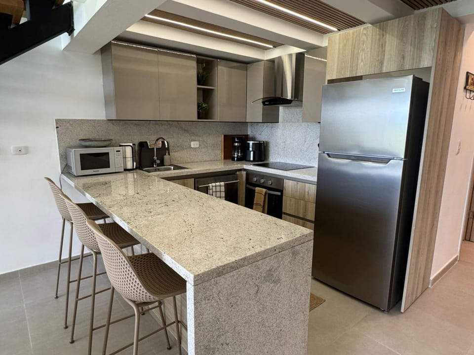 Kitchen or kitchenette, Dining area, oven, stove, toaster