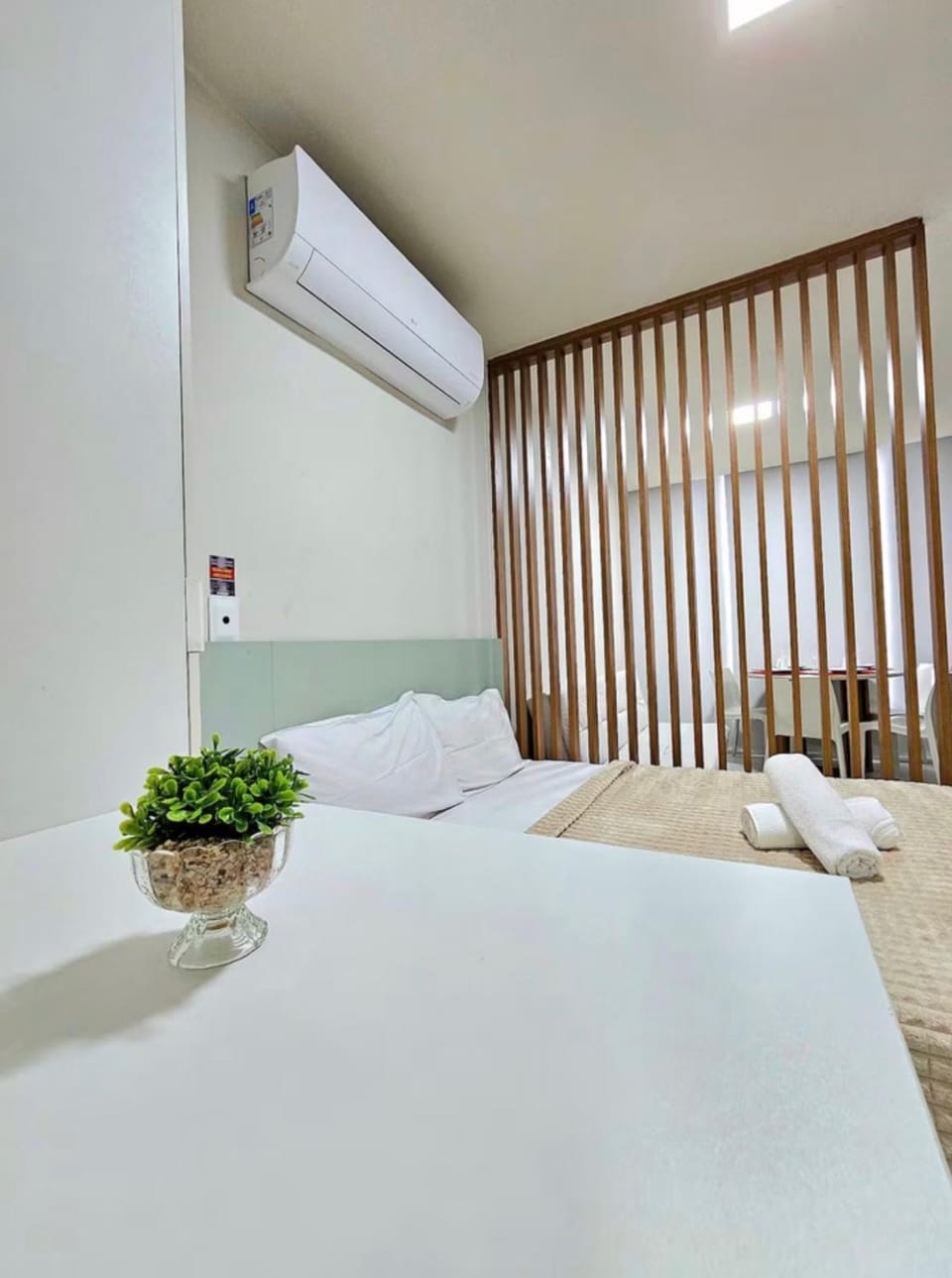 Bed, air conditioner