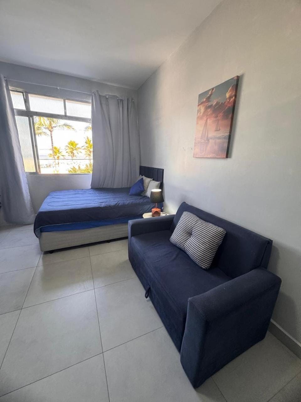 Apê Design Pé na Areia Vista Total do Mar Praia Tupi Apartment in State of São Paulo