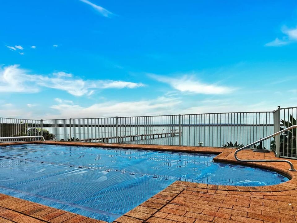 Toukley Waterfront Apartment with Balcony - Outdoor Pool - Secure Parking - Wi-Fi - By HappyHosts Apartment in Toukley