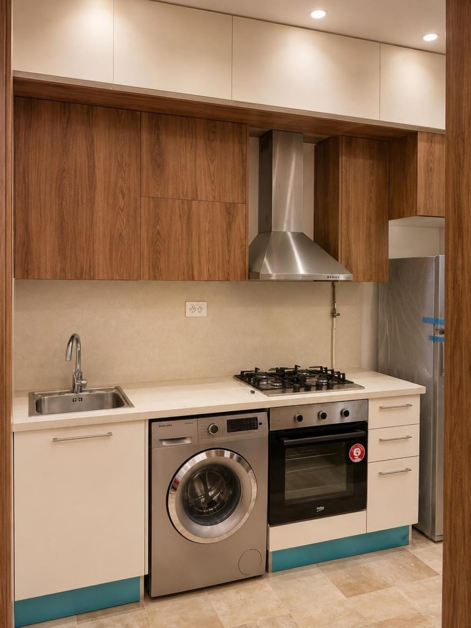 Kitchen or kitchenette, oven, stove, washing machine