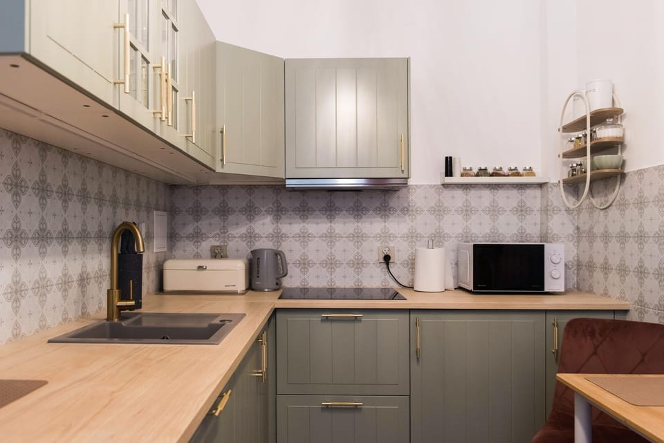 Kitchen or kitchenette, microwave, oven, stove, kitchen