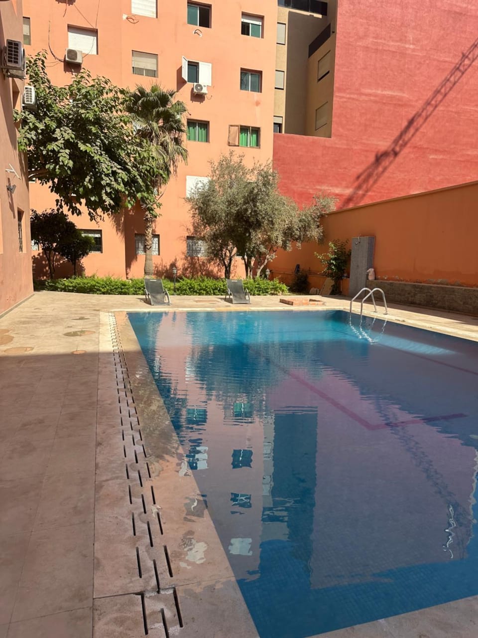 Property building, Day, Pool view, Swimming pool