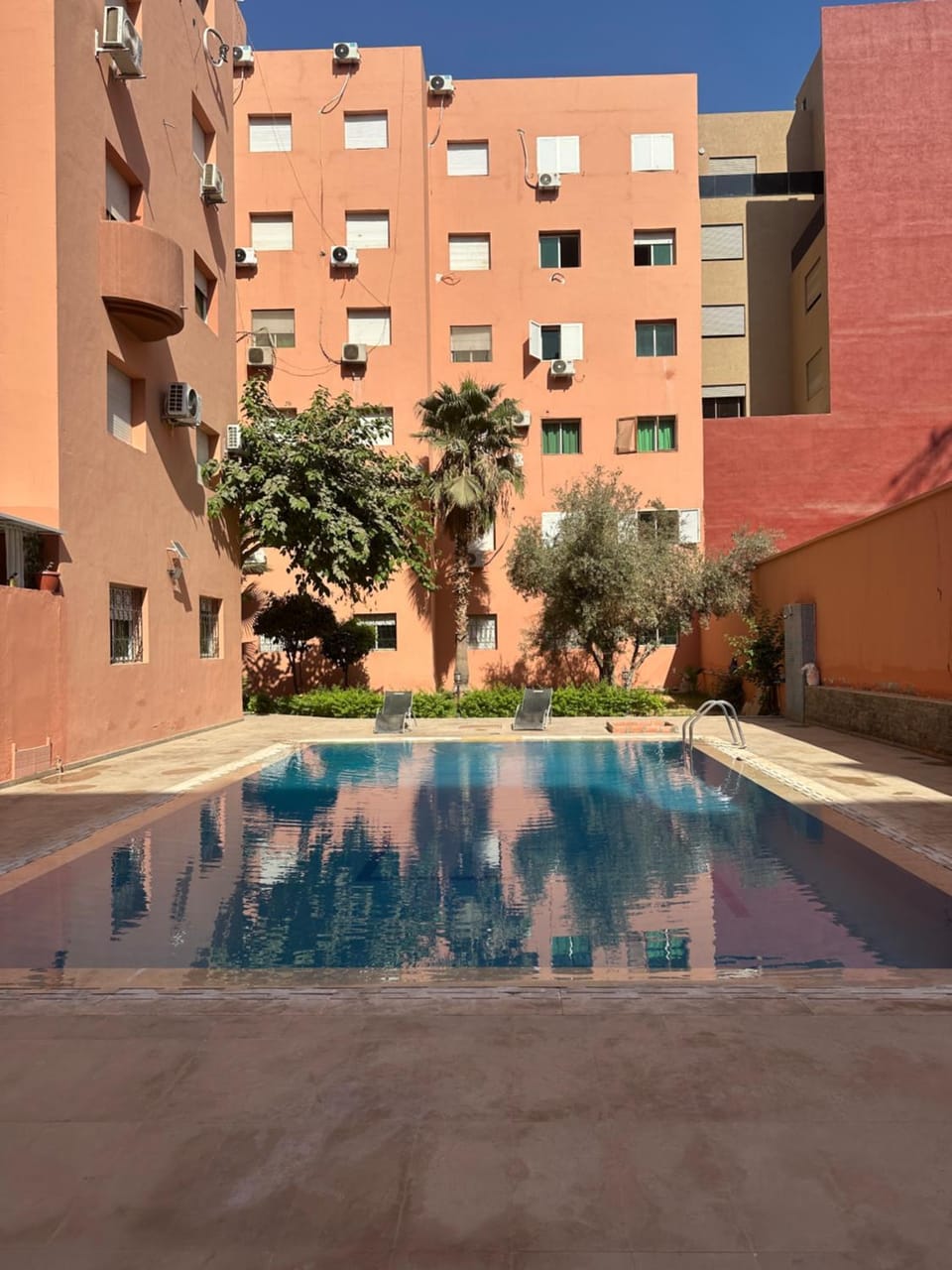 Property building, Day, Pool view, Swimming pool