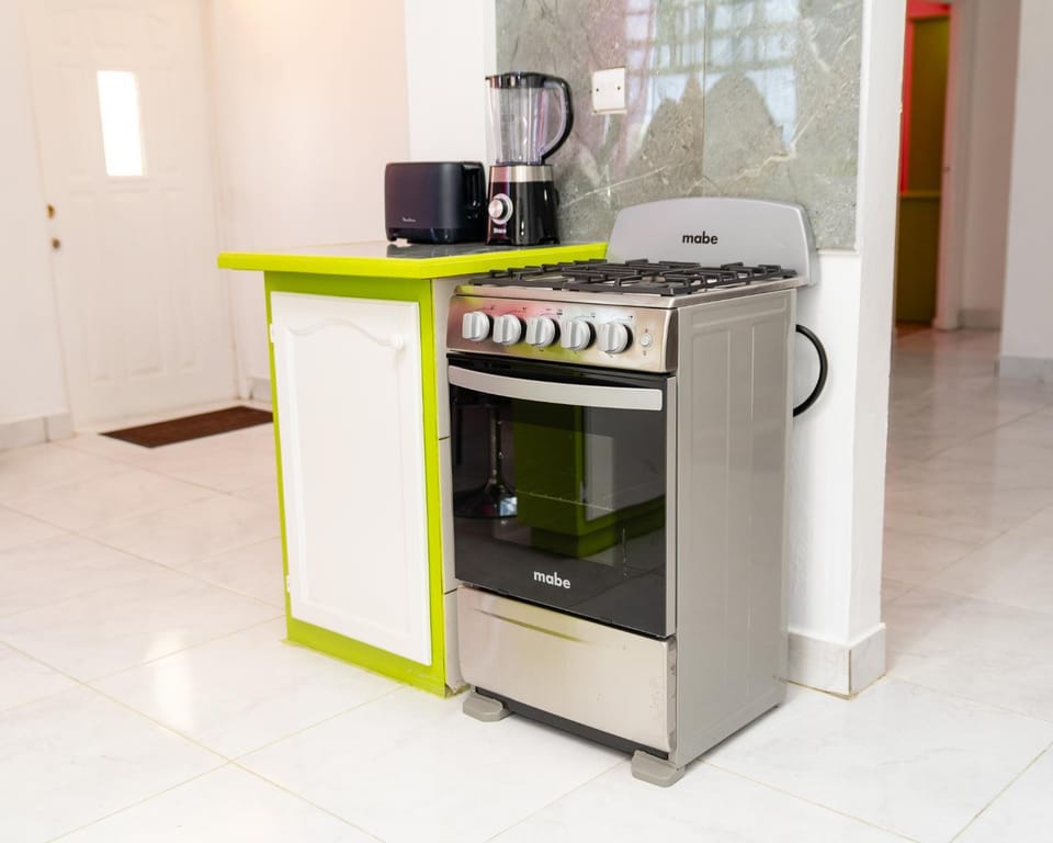 Kitchen or kitchenette, oven, stove, toaster