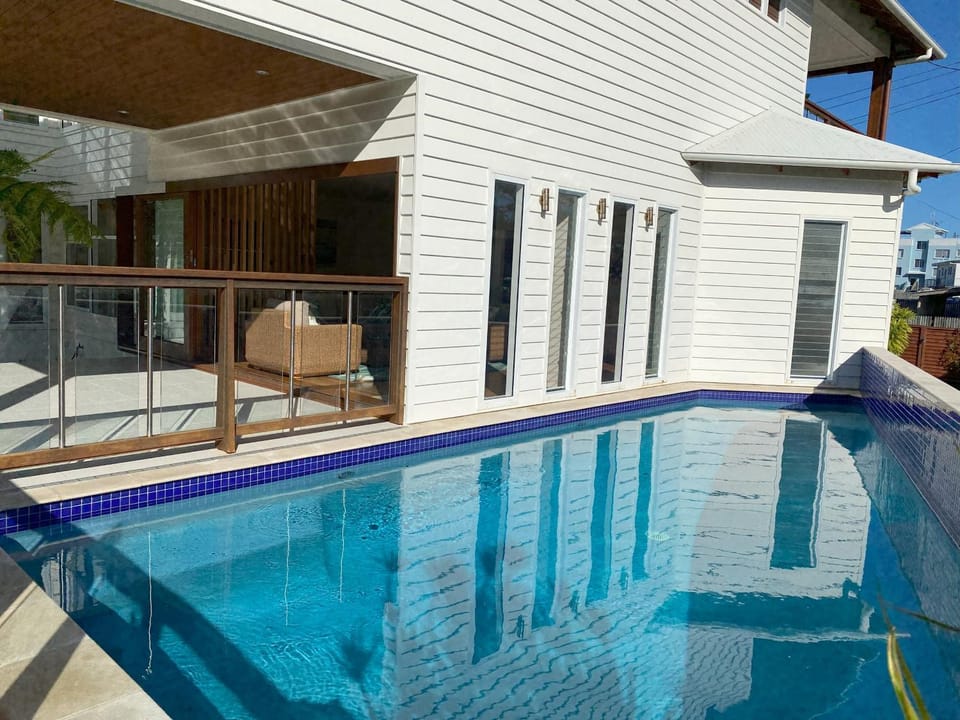 Beautiful family beach house with pool adjacent to the bay's beach beach House in Hervey Bay