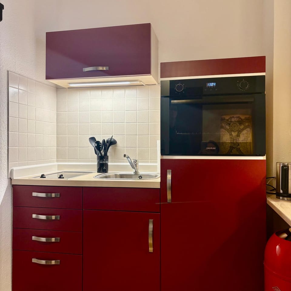 Kitchen or kitchenette, stove