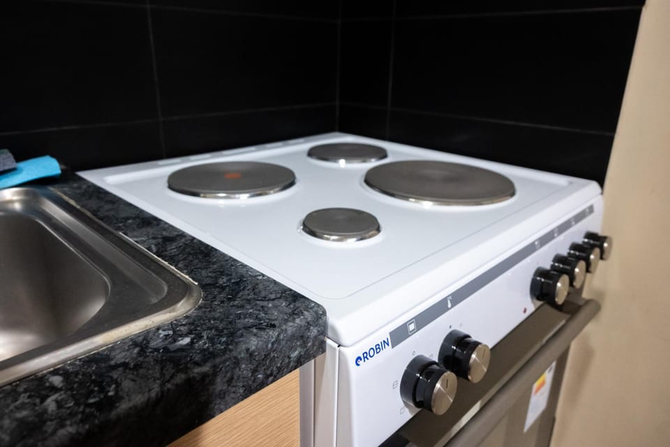 Kitchen or kitchenette, stove
