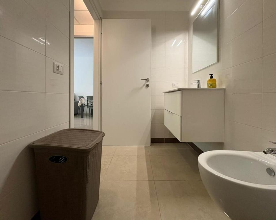 Toilet, bidet, hair dryier, towels