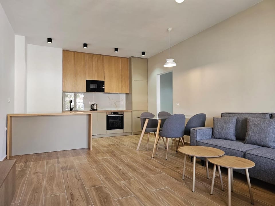 Kitchen or kitchenette, Living room, Seating area, Dining area
