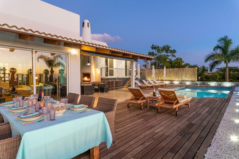 Property building, Patio, Day, Dining area, Pool view, Swimming pool, sunbed