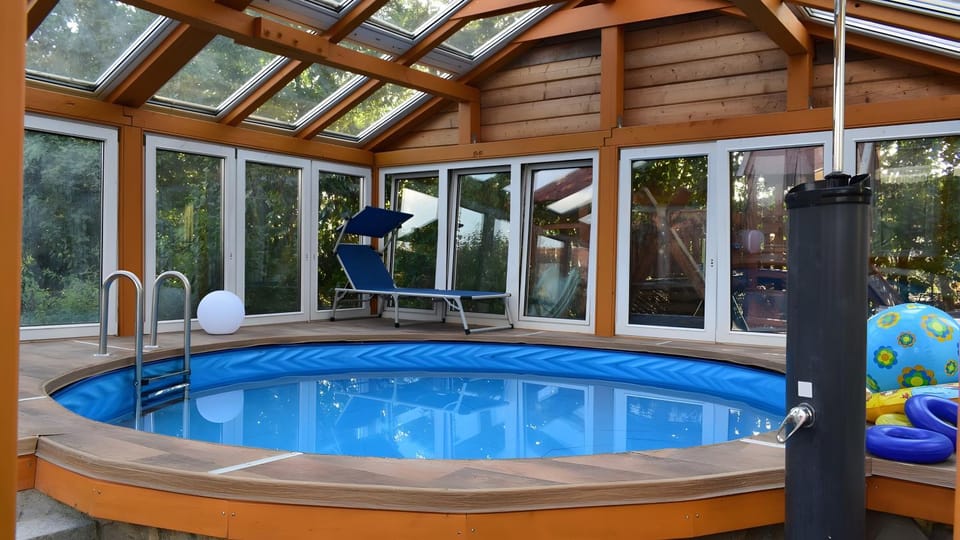 Property building, Living room, Swimming pool