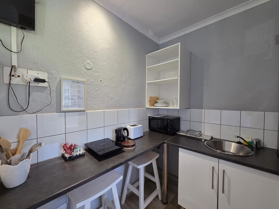 Kitchen or kitchenette, microwave