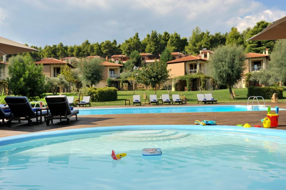 Property building, Patio, Nearby landmark, Spring, Day, People, Neighbourhood, Natural landscape, Activities, Activities, Summer, Garden, Food and drinks, Other, Kids's club, Evening entertainment, Guests, City view, Garden view, Landmark view, Pool view, Street view, Swimming pool, Family, furniture, internet, room service, sunbed, towels, VIP, VIP, wedding, wedding, air conditioner