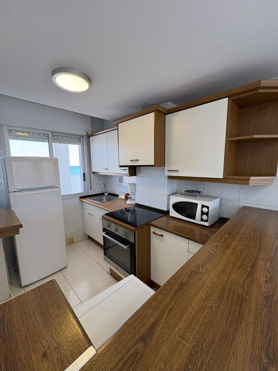 Kitchen or kitchenette, oven