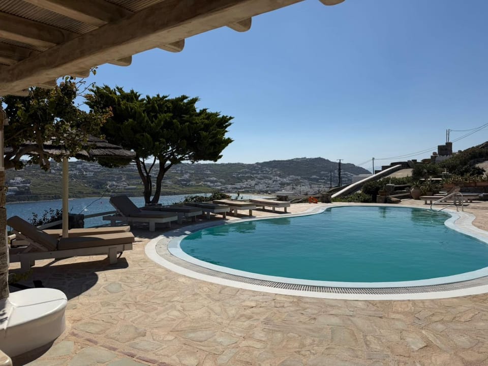 View (from property/room), Pool view, Sea view, Swimming pool, Location